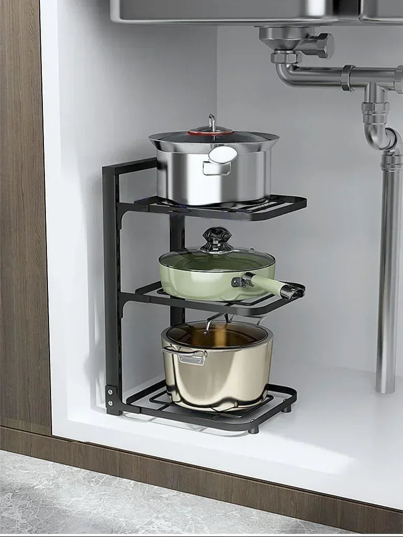 Étagère cuisine noire robuste pour ranger cocottes et poêles.

Organisation parfaite des casseroles dans l'étagère SmartCook™.

Détail du système de clips pour une hauteur réglable sur l'étagère.

Close-up sur la structure en acier inoxydable du range cocotte.

Étagère de cuisine remplie de divers ustensiles, wok et couvercles.

Fonctionnement du système à clipser pour ajuster les niveaux.

Étagère de rangement intégrée dans un placard de cuisine organisé.

Comparaison avant/après montrant le gain de place 