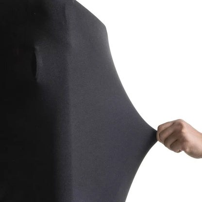 Housse pour valise FlexiGuard extensible protégeant efficacement les bagages contre rayures, saleté et usure lors des voyages en avion ou en train