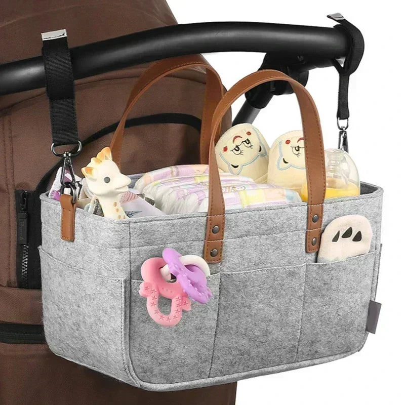 organisateur de poussette universel, sac de rangement pour poussette bébé, organisateur de poussette grande capacité, panier de rangement pliable pour poussette, sac suspendu pour poussette de voyage, organisateur de poussette en feutre élégant, rangement poussette pour couches et biberons, sac de poussette multifonction avec poches, organisateur de poussette portable avec poignées, rangement pratique pour accessoires de bébé, organisateur de poussette pour maman active, sac de rangement suspendu pour pouss