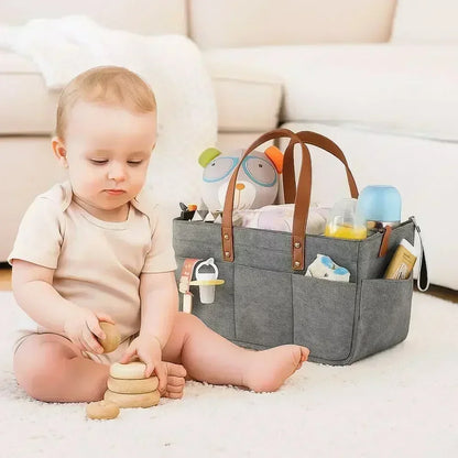 organisateur de poussette universel, sac de rangement pour poussette bébé, organisateur de poussette grande capacité, panier de rangement pliable pour poussette, sac suspendu pour poussette de voyage, organisateur de poussette en feutre élégant, rangement poussette pour couches et biberons, sac de poussette multifonction avec poches, organisateur de poussette portable avec poignées, rangement pratique pour accessoires de bébé, organisateur de poussette pour maman active, sac de rangement suspendu pour pouss