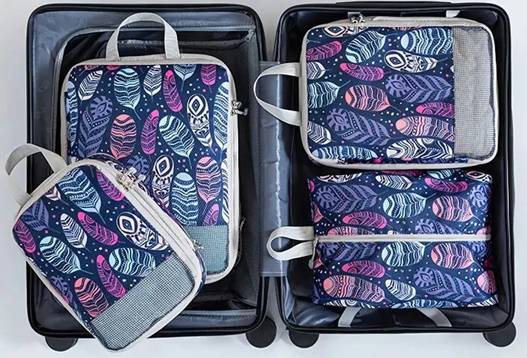 Organisateur de valise compression Élégance Voyage avec système de compression manuelle, set de 4 sacs pour optimiser l’espace en valise cabine et organiser efficacement les vêtements