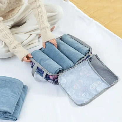 Organisateur de valise compression Élégance Voyage avec système de compression manuelle, set de 4 sacs pour optimiser l’espace en valise cabine et organiser efficacement les vêtements