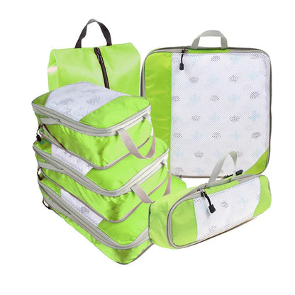 Set organisateur de valise compressible TravelPack™, sacs de rangement en polyester respirant, solution gain de place pour bagage cabine et long séjour.