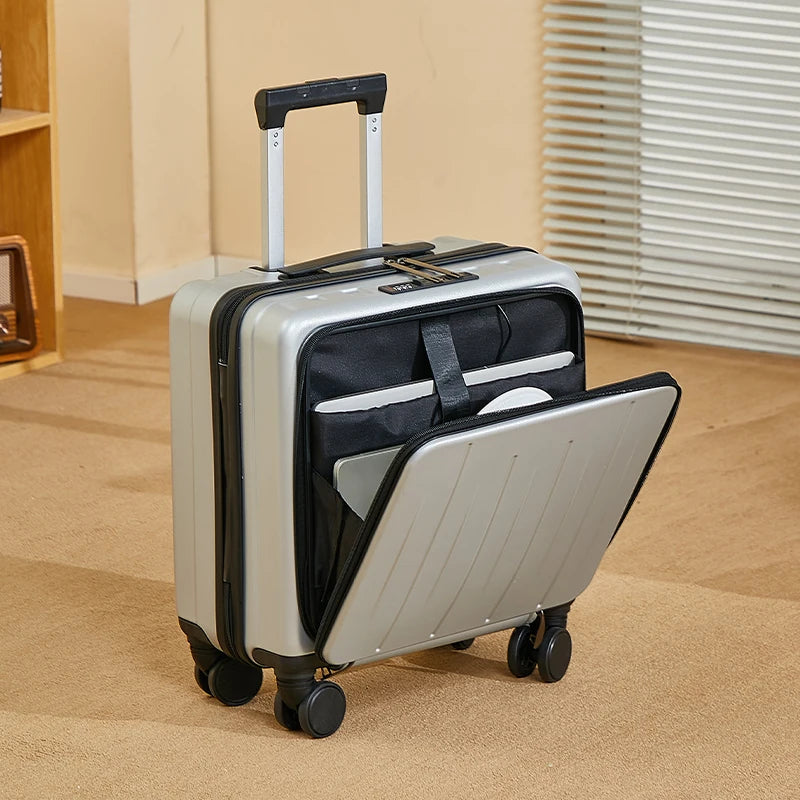 Petite valise cabine 18 pouces UrbanMove18 avec ouverture frontale, conçue en ABS robuste, équipée de roues pivotantes 360°, d’une fermeture sécurisée par code, d’une poignée télescopique, d’un port USB intégré et d’un porte-gobelet, proposée par Rangement Chic pour des voyages urbains élégants et pratiques.