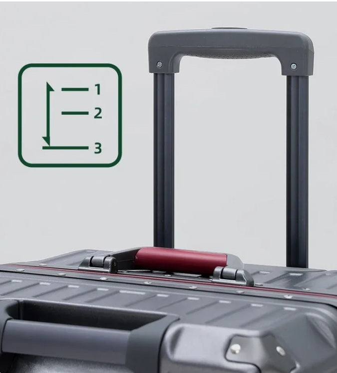 Poignée télescopique en aluminium réglable sur valise cabine pour un confort de traction optimal