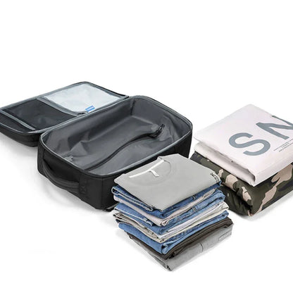 Sac a dos voyage compression sous vide Airbag Business™ : compact, étanche, USB, grande capacité extensible et organisation optimale.