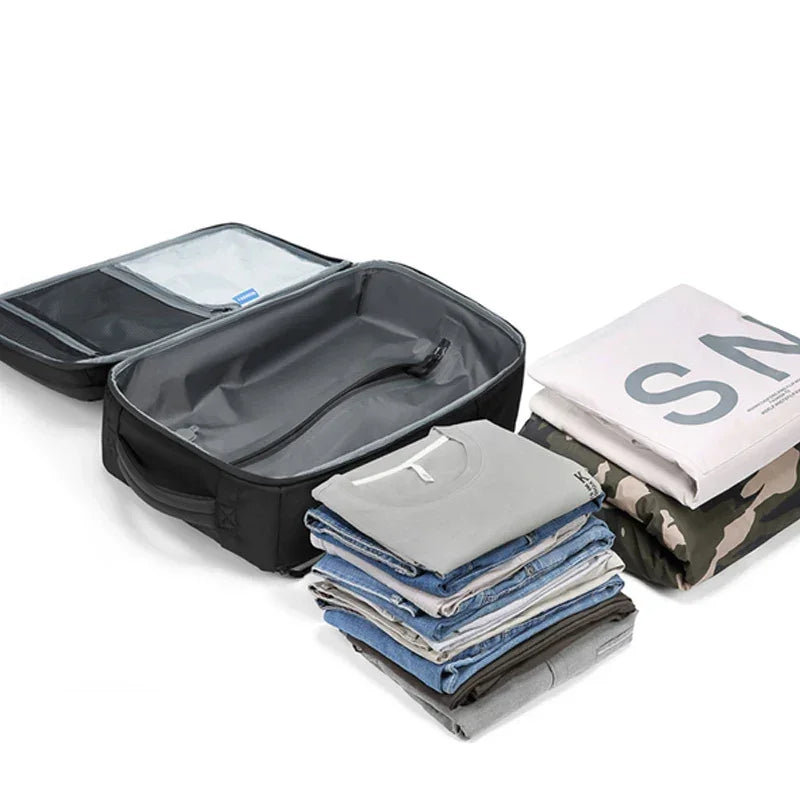 Sac a dos voyage compression sous vide Airbag Business™ : compact, étanche, USB, grande capacité extensible et organisation optimale.