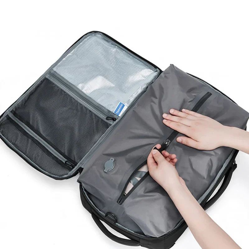 Sac a dos voyage compression sous vide Airbag Business™ : compact, étanche, USB, grande capacité extensible et organisation optimale.