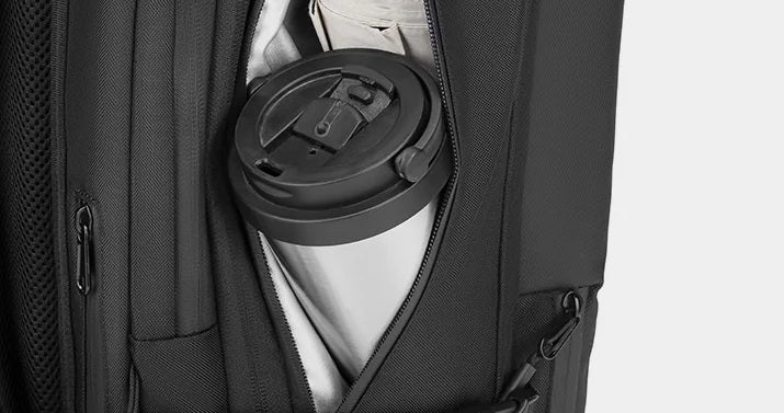 sac à dos compression sous vide avec rangement bouteille, idéal voyage cabine