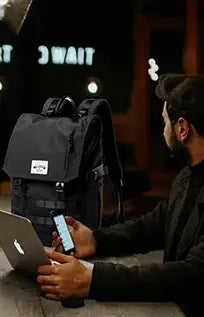 sac a dos roll top grande capacite 40 litres avec poches laterales bouteille