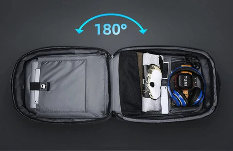 Sac-a-dos-antivol-nomad-shield, modèle Explorer Pro ouvert à 180° montrant son organisation pour ordinateur 15,6 pouces et tablette.