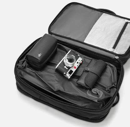 Sac de compression electrique ReeYee range dans un sac de voyage