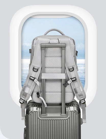 Sac de voyage à dos gris avec grande ouverture et compartiments organisés, sac à dos de voyage extensible pour avion, une sangle pour valise