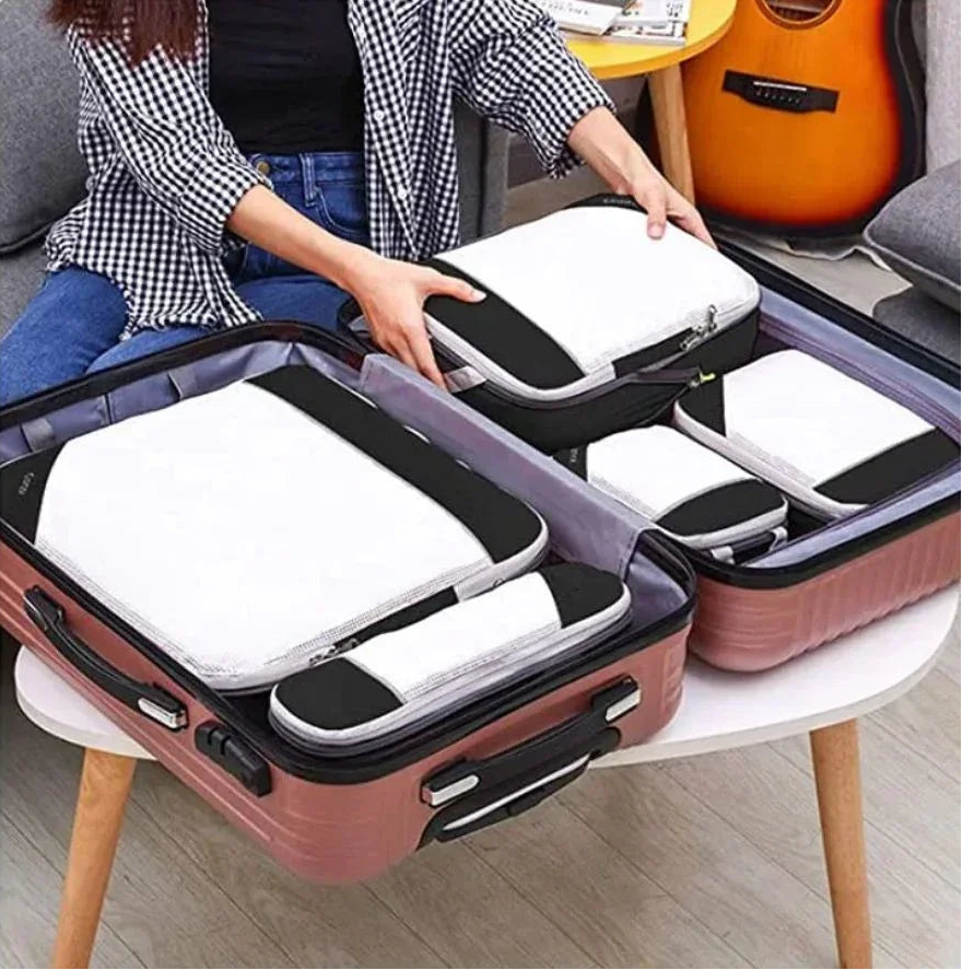 Cubes de rangement TravelPack™ set 6 pièces, organisateur de valise compression pour valise cabine, gain de place, vêtements organisés et sans froissements.